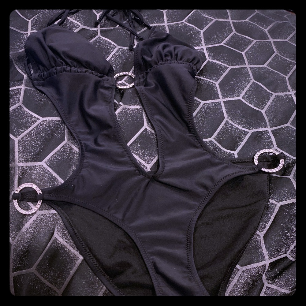 One piece all black swimsuit with rhinestones.